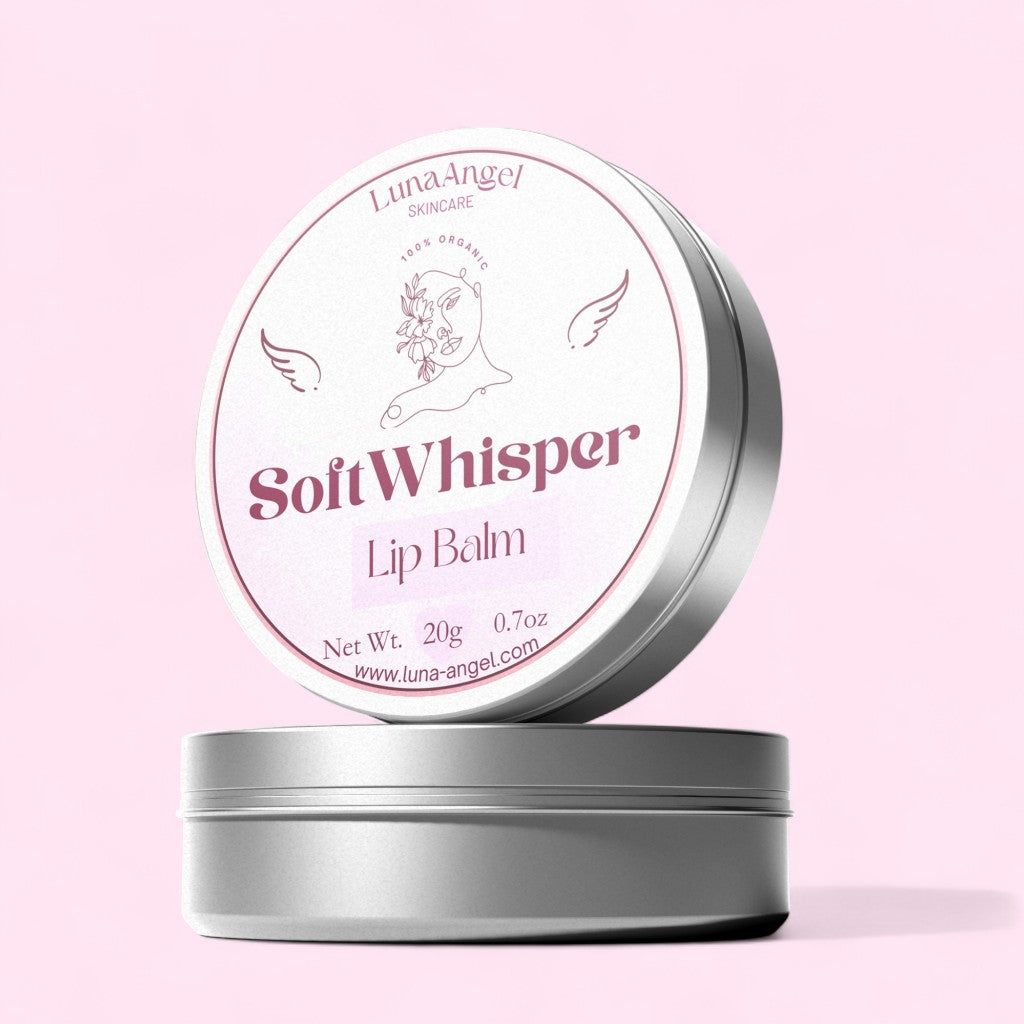 Luna Angel Soft Whisper lip balm tin on a pink background