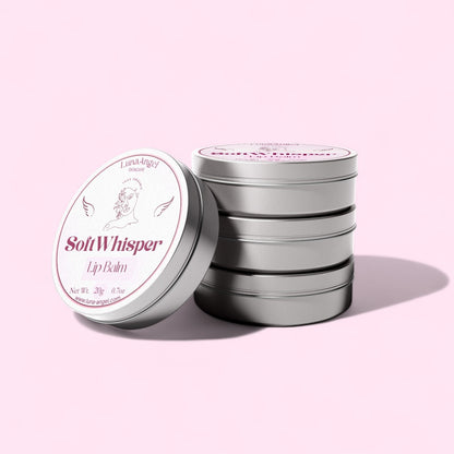 Stack of 'Soft Whisper' lip balm tins on a pink background