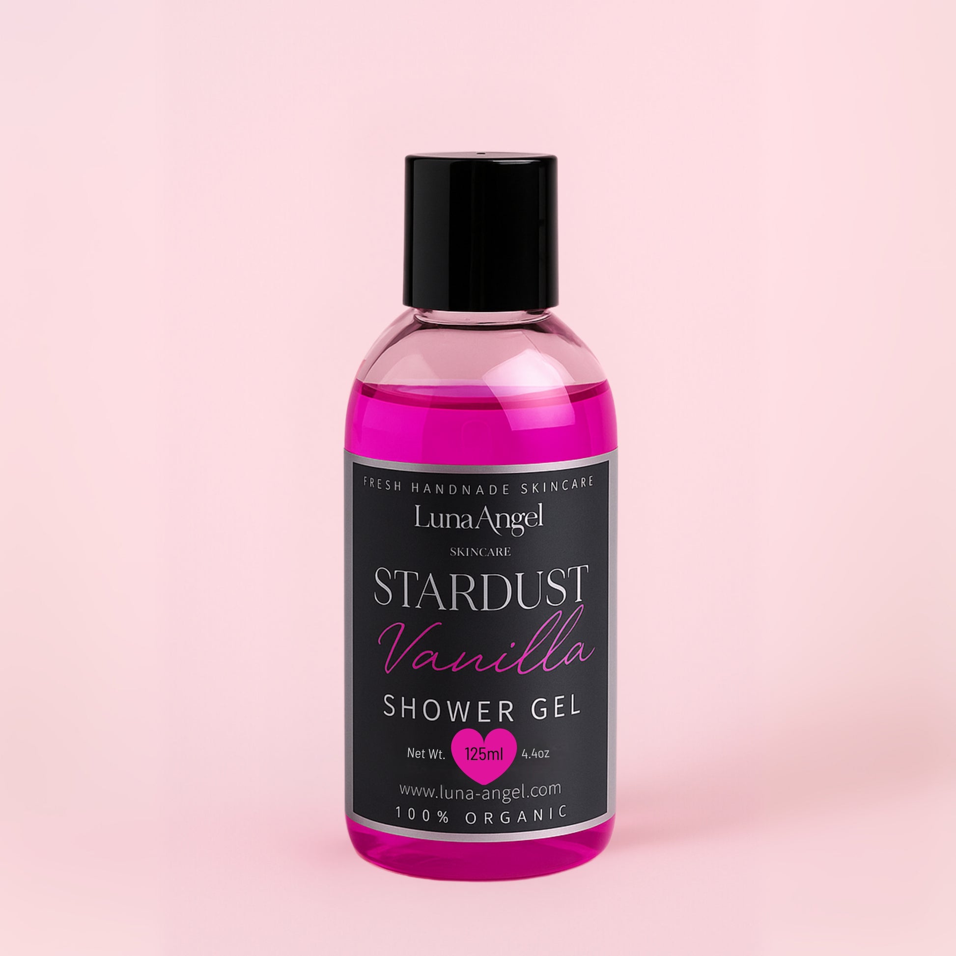 Bottle of Luna Angel Stardust Vanilla Shower Gel on a pink background