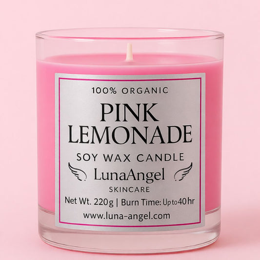 Pink lemonade soy wax candle with LunaAngel label on a pink background