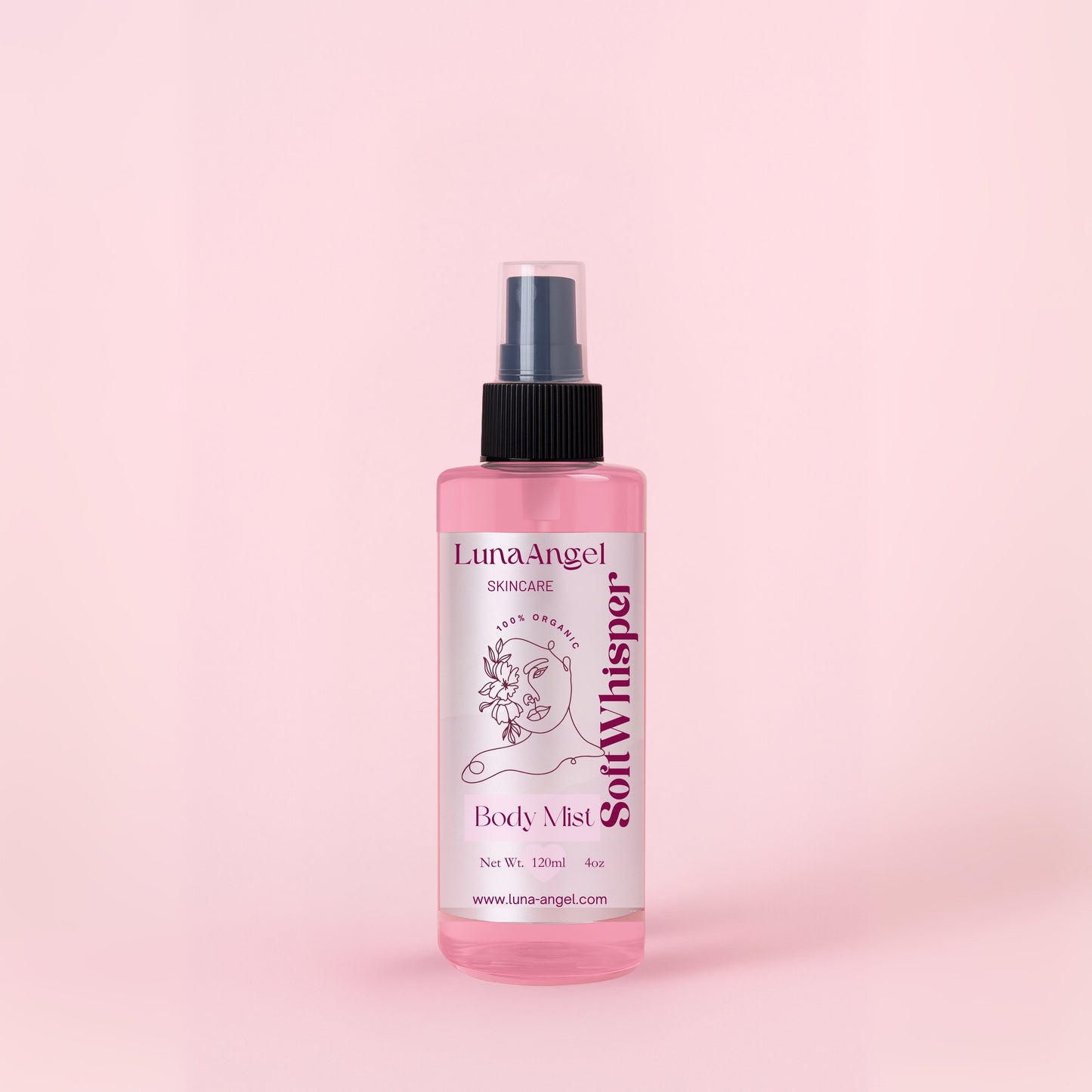 Soft Whisper body mist bottle on soft pink background