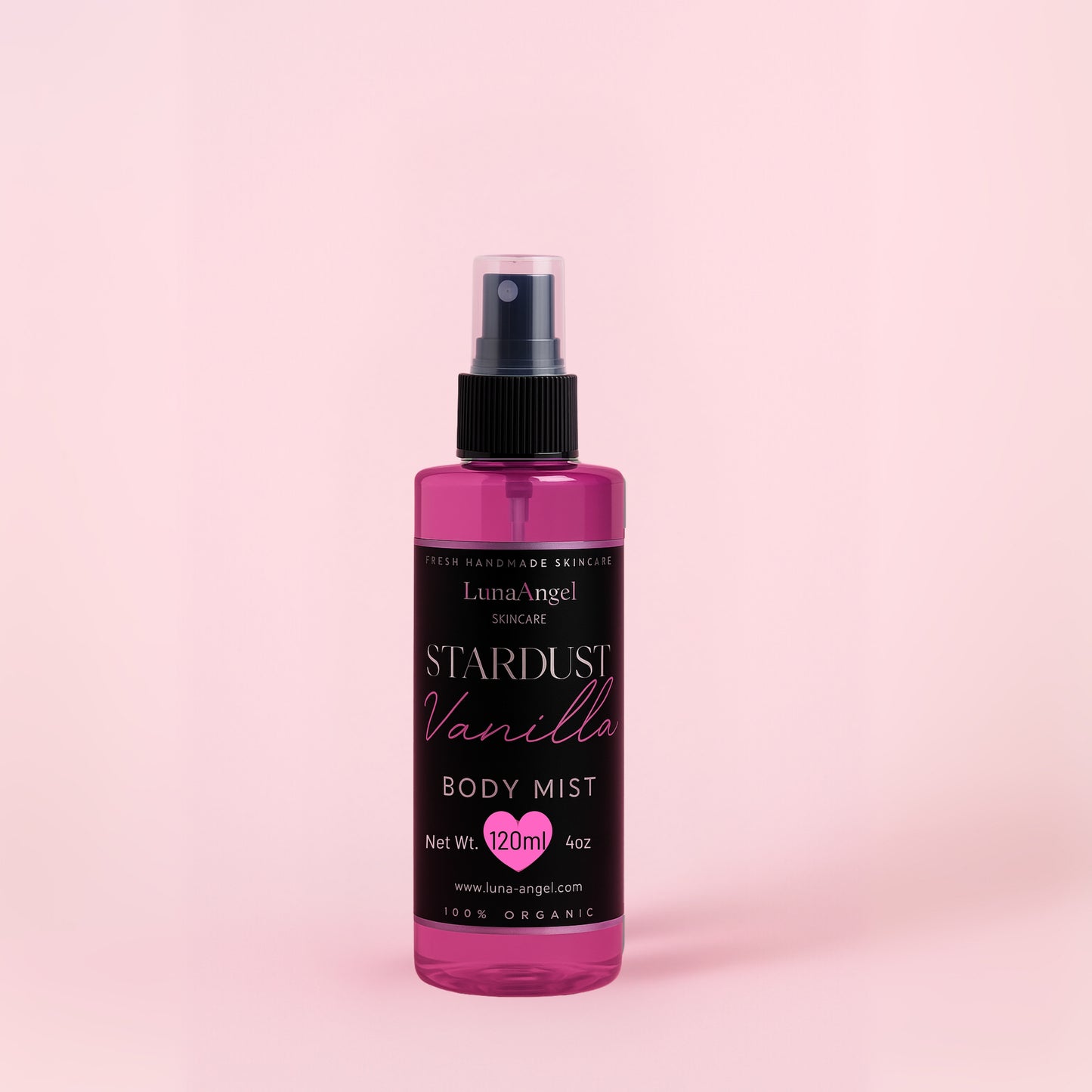 Stardust Vanilla body mist bottle close-up on pink background