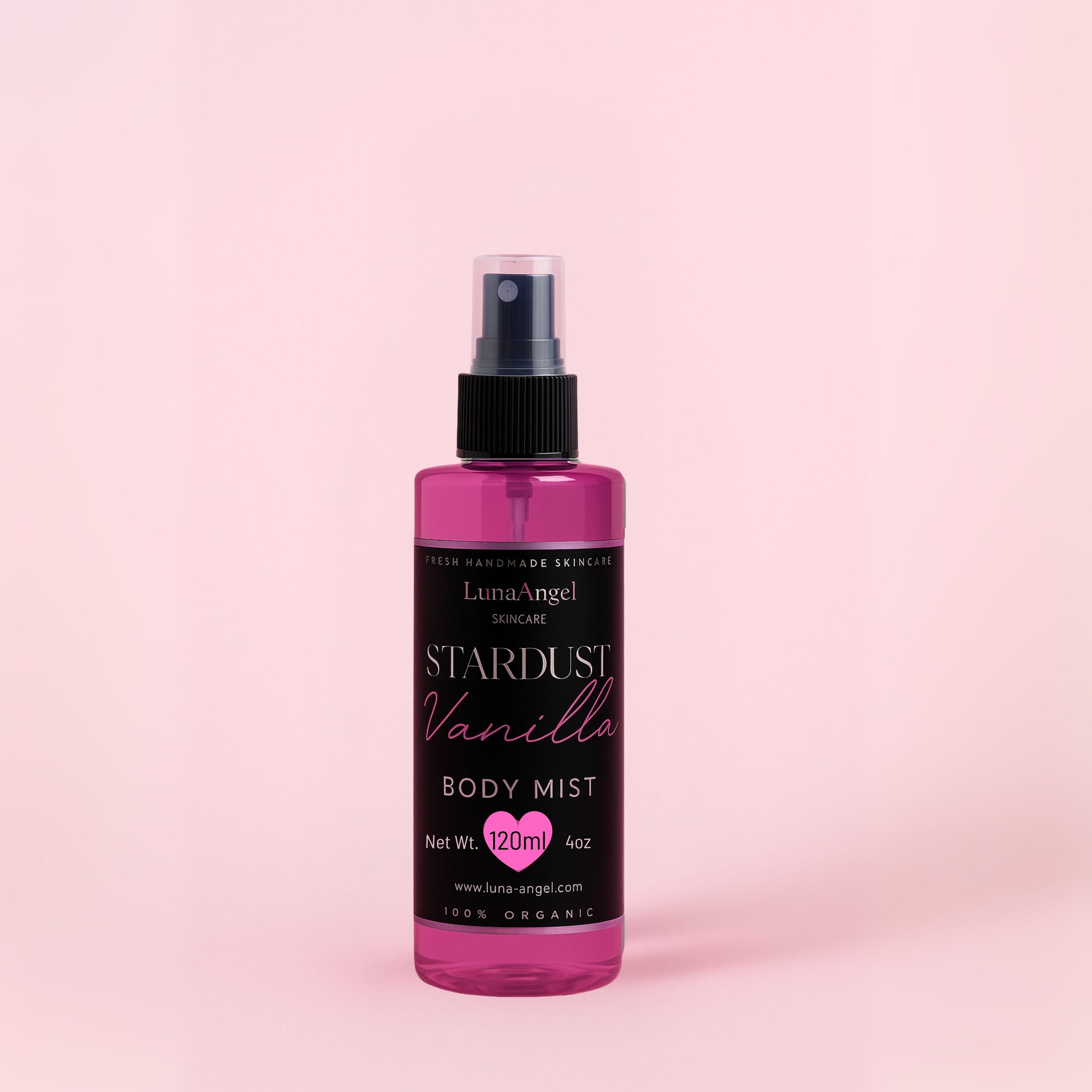 Stardust Vanilla body mist bottle close-up on pink background