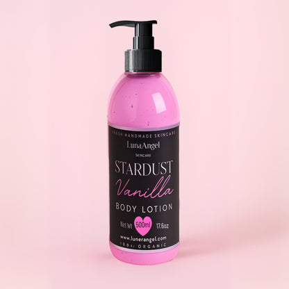 Pink body lotion bottle with black label on a pink background