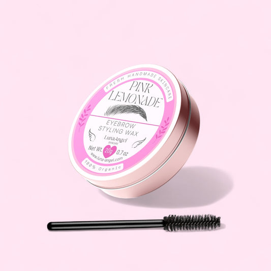Pink Lemonade eyebrow styling wax with a applicator on a light pink background